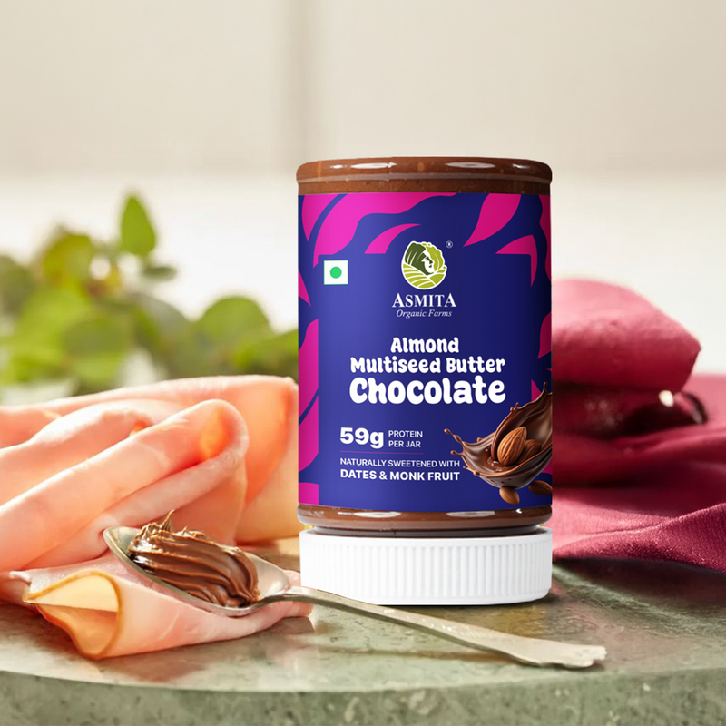 chocolate almond multi seed butter with a spoon